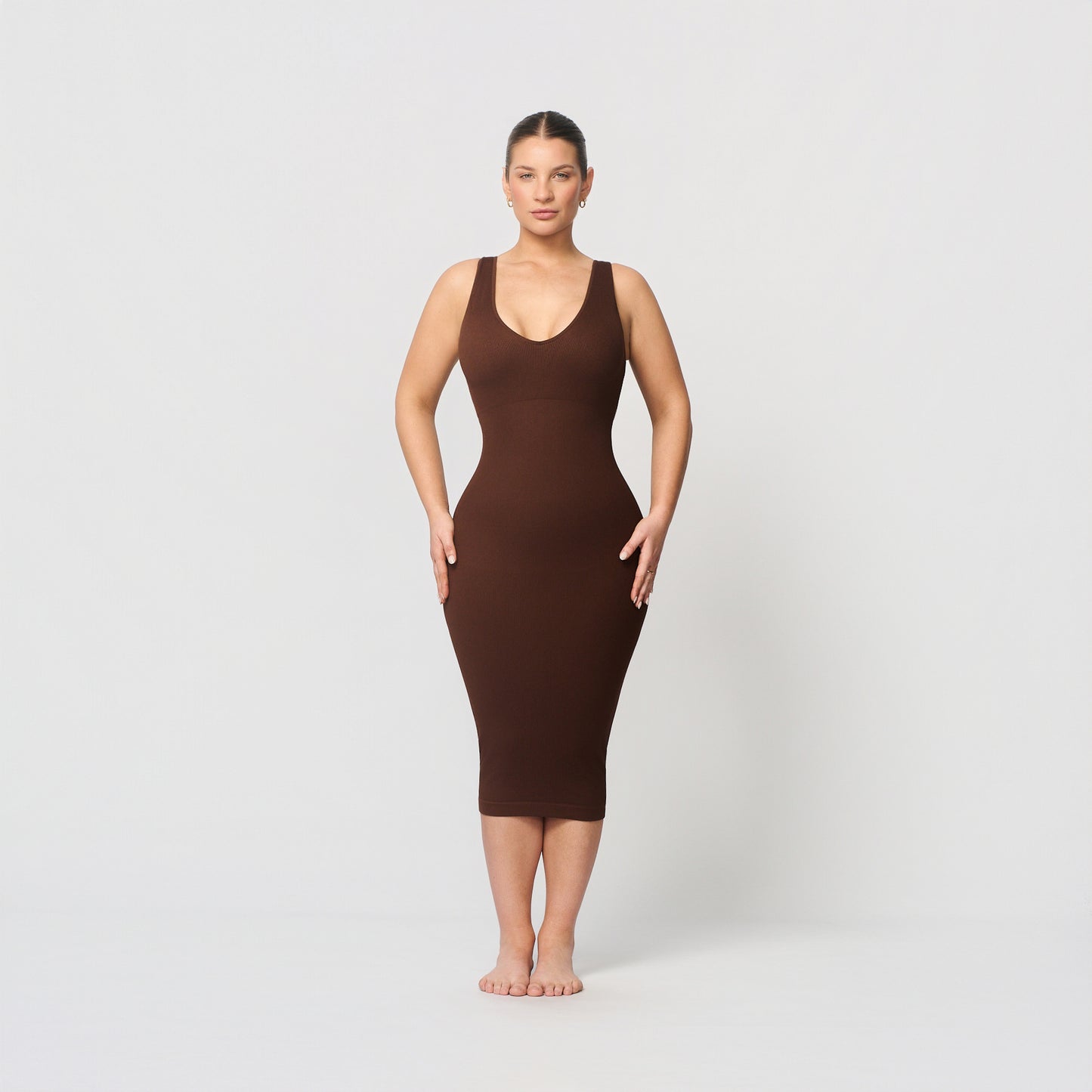 Seamless shaping dress with deep V-neckline