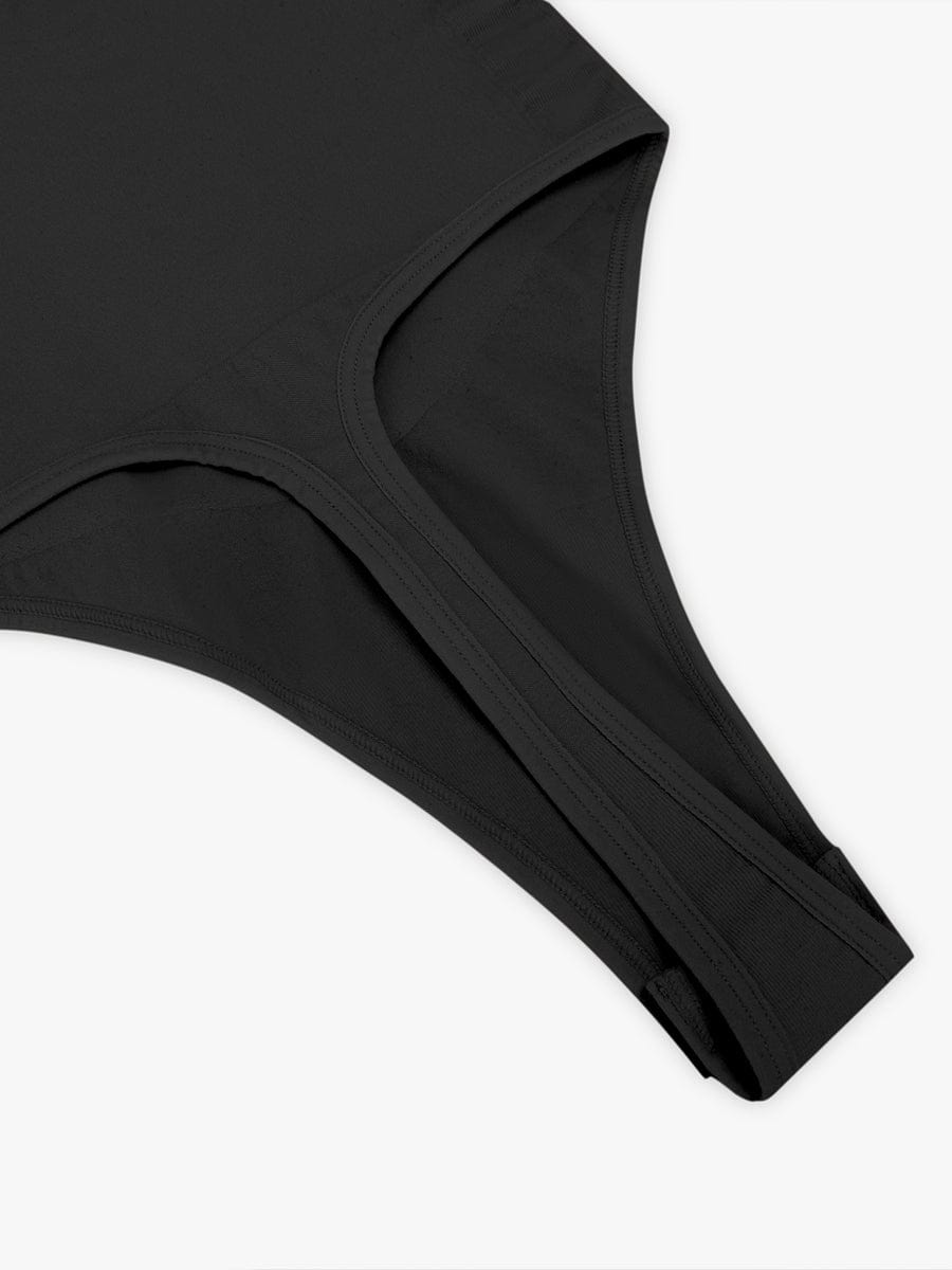 Shapingbody med glidelås og hemper